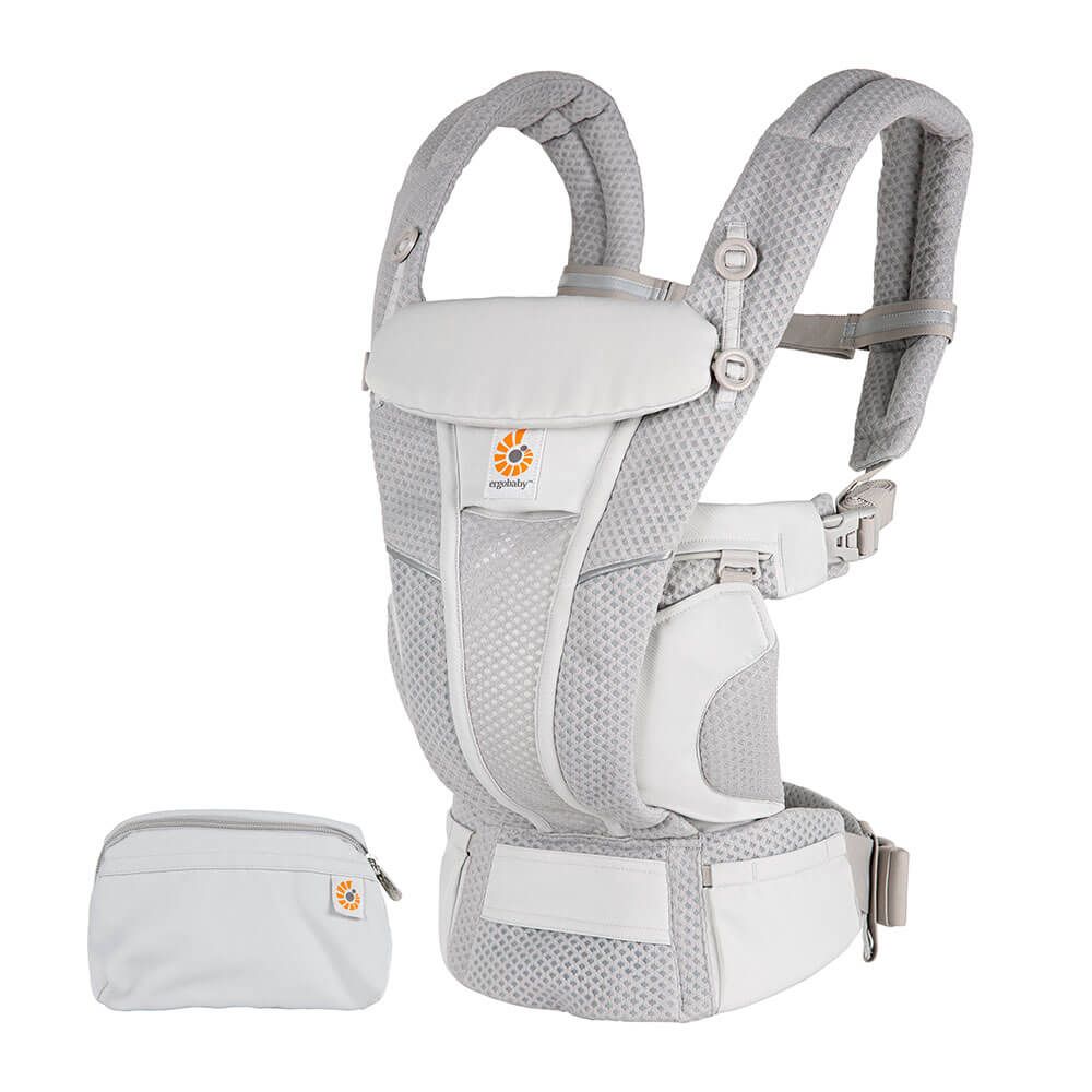 Ergobaby Omni Breeze All-in-One Baby Carrier in light grey, shown with breathable mesh panels and a matching storage pouch – ideal for ergonomic babywearing from newborn to toddler.