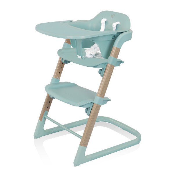 Maxi Cosi Moa 8-in-1 High Chair in teal with wooden legs, designed for growing children with adjustable features.