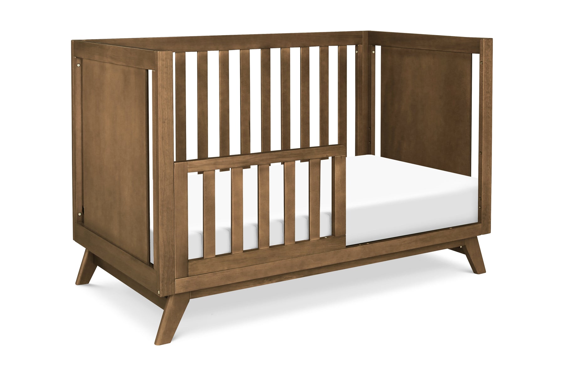 DaVinci Otto 3-in-1 Convertible Crib in a light wood finish with adjustable mattress settings.