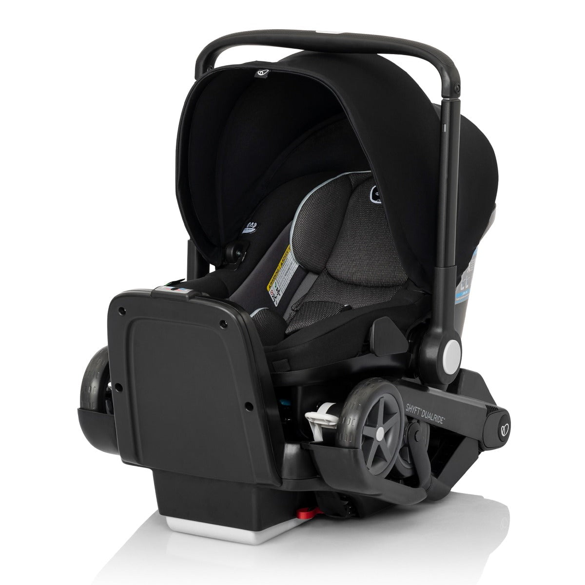 Evenflo Shyft DualRide Infant Car Seat, showcasing its compact design and sturdy base with integrated wheels.